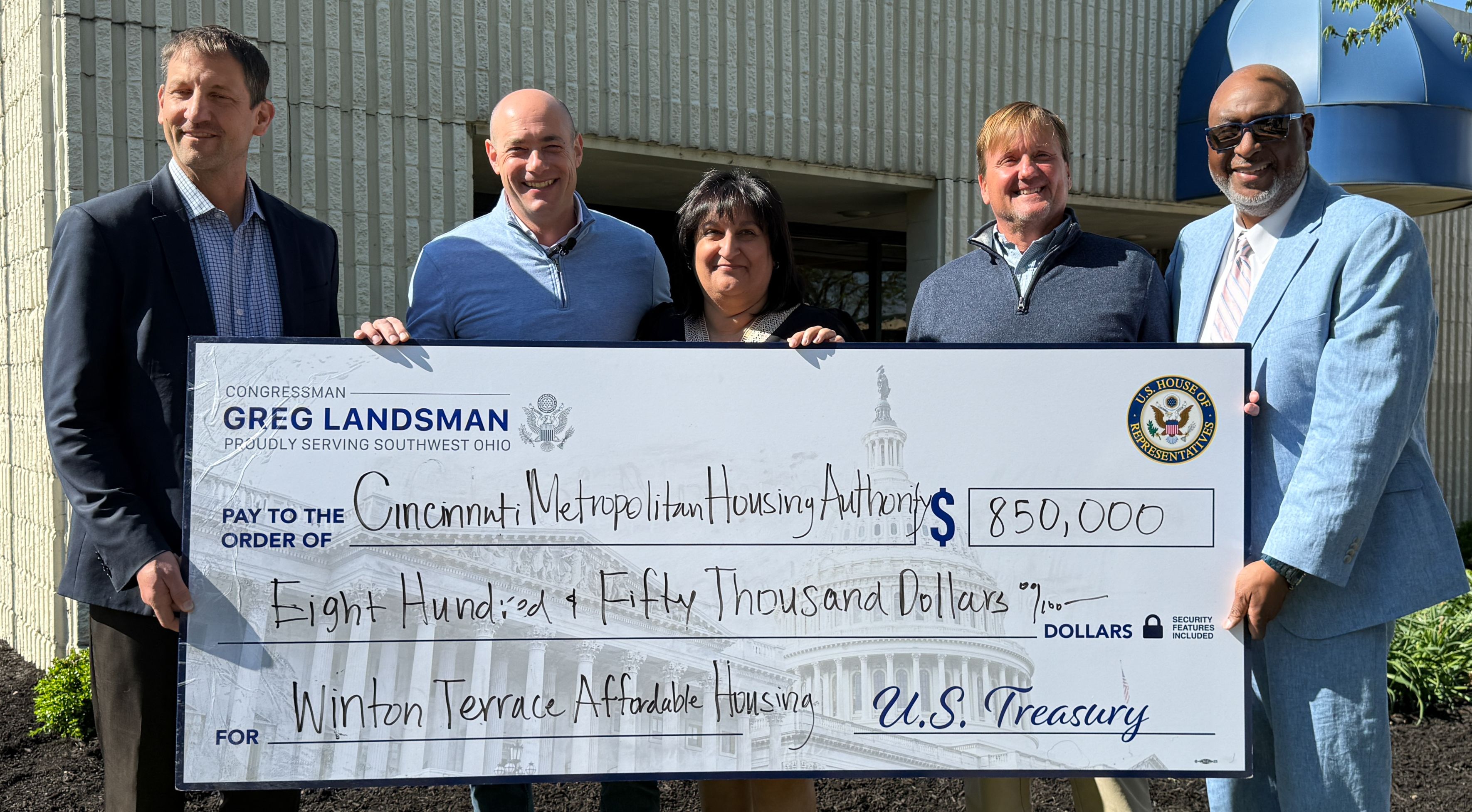 Congressman Greg Landsman presents CMHA a check for renovation